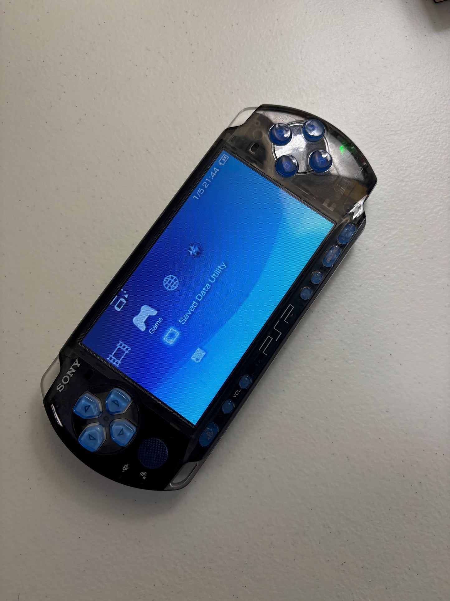 Transparent Black/Blue Buttons Console